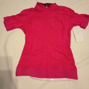 Lululemon hot pink zip up short sleeve jacket. NWT